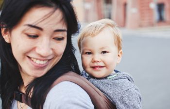 woman with a baby on her back