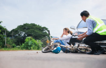 road accident cyclist and car